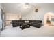 Large living room with high ceilings, neutral carpet, and sectional sofa at 304 Bennett Farms Ct, Acworth, GA 30102