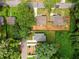 Aerial view displays the layout, landscaping, and fencing, offering a comprehensive property overview at 951 Reed Ave, Atlanta, GA 30344