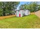Property shows a large backyard with fence, highlighting the property's outdoor space and privacy at 951 Reed Ave, Atlanta, GA 30344