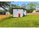 Spacious backyard with new fence borders the property, adding security and a defined boundary at 951 Reed Ave, Atlanta, GA 30344