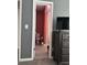 View of toilet and shower through doorway, showcasing modern bathroom design at 4210 Chatham Ridge Drive Dr, Buford, GA 30518