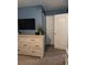 Bedroom with a dresser and a TV at 4210 Chatham Ridge Drive Dr, Buford, GA 30518
