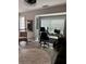 Bonus room with hardwood floors, large window, and an office space at 4210 Chatham Ridge Drive Dr, Buford, GA 30518