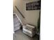 Inviting foyer featuring hardwood floors, stairs to the second floor, and decorative accents, creating a welcoming ambiance at 4210 Chatham Ridge Drive Dr, Buford, GA 30518