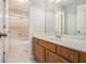 Well-lit bathroom features a vanity with storage and a shower/tub combo at 5575 Julian Pl, Atlanta, GA 30342