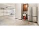 Functional garage space featuring a refrigerator, sink, and access to additional rooms at 5575 Julian Pl, Atlanta, GA 30342