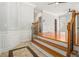 Spacious living room with hardwood floors, wainscoting, and a bright, open layout at 5575 Julian Pl, Atlanta, GA 30342