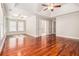 Open main bedroom features trey ceiling, ceiling fan, and natural light throughout at 5575 Julian Pl, Atlanta, GA 30342