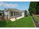 Well-maintained backyard with a patio and lush lawn at 507 Bonneset Ct, Canton, GA 30114