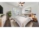 Cozy bedroom with natural light, hardwood floors and neutral decor at 507 Bonneset Ct, Canton, GA 30114
