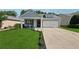 Charming single-Gathering home featuring a well-manicured lawn, a two-car garage, and welcoming front porch at 507 Bonneset Ct, Canton, GA 30114