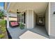 Cozy front porch with a swing, ceiling fan, and grey accents, perfect for relaxing outdoors at 507 Bonneset Ct, Canton, GA 30114