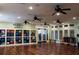 Bright gym with hardwood floors, fitness equipment, and motivational quote, promoting an active lifestyle at 507 Bonneset Ct, Canton, GA 30114
