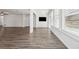 Spacious living room with hardwood floors and natural light at 507 Bonneset Ct, Canton, GA 30114