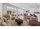 Open-concept living area with hardwood floors, stylish furniture, and plenty of natural light at 507 Bonneset Ct, Canton, GA 30114