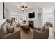 Bright and airy living room with hardwood floors, a fireplace, and open-concept design at 507 Bonneset Ct, Canton, GA 30114