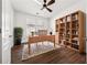 Office space with natural light, built-in shelving, and hardwood floors at 507 Bonneset Ct, Canton, GA 30114