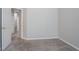 Bedroom features plush carpet and neutral paint at 6207 Idlewood Cir, Lithonia, GA 30038
