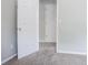 Hallway featuring plush carpet and neutral paint at 6207 Idlewood Cir, Lithonia, GA 30038
