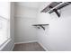 Walk-in closet featuring a window and built in shelving at 6207 Idlewood Cir, Lithonia, GA 30038