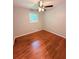 Cozy bedroom with hardwood floors and a bright window at 1098 Laurel Nw Ln, Conyers, GA 30012