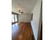 Spacious living room featuring hardwood floors and large window at 1098 Laurel Nw Ln, Conyers, GA 30012
