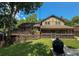 Exterior view showcases a backyard with a wood deck and screened in porch at 1280 Sanden Ferry Dr, Decatur, GA 30033