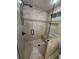 Bathroom features a beautifully tiled shower, glass door, and built-in bench seating at 1280 Sanden Ferry Dr, Decatur, GA 30033