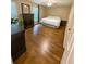 This bedroom has hardwood floors, a ceiling fan, and lots of natural light at 1280 Sanden Ferry Dr, Decatur, GA 30033