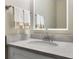 Close up of bathroom vanity with granite countertop and modern fixtures at 1420 Fieldgreen Overlook, Stone Mountain, GA 30088