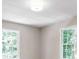 Bright bedroom featuring double hung windows and neutral paint at 1420 Fieldgreen Overlook, Stone Mountain, GA 30088