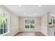 Dining room with hardwood floors, neutral paint, white trim, and recessed lighting at 1420 Fieldgreen Overlook, Stone Mountain, GA 30088