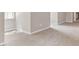 Living room with plush carpet, and neutral paint at 1420 Fieldgreen Overlook, Stone Mountain, GA 30088