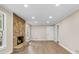 Inviting living room showcases stone fireplace and great natural light at 1420 Fieldgreen Overlook, Stone Mountain, GA 30088