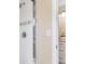 Modern shower stall featuring glass door and tile accent stripe at 1420 Fieldgreen Overlook, Stone Mountain, GA 30088