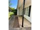 Front porch with black columns and black shutters on windows at 298 Thorn Thicket Dr, Rockmart, GA 30153