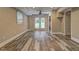 Finished basement with wood-look flooring, a door to the backyard, and laundry hookups at 1675 Bouldercliff Se Ct, Atlanta, GA 30316