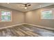 Bedroom with hardwood floors, neutral walls and plenty of light from two windows at 1675 Bouldercliff Se Ct, Atlanta, GA 30316