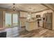 Modern kitchen featuring white cabinets, stainless steel appliances, and a kitchen island at 1675 Bouldercliff Se Ct, Atlanta, GA 30316