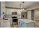 Well-equipped kitchen with island, stainless appliances, and modern lighting at 1675 Bouldercliff Se Ct, Atlanta, GA 30316