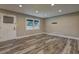 Well-lit living room with wood floors, fresh paint and large window for natural light at 1675 Bouldercliff Se Ct, Atlanta, GA 30316