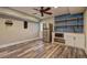 Open living room featuring a beverage center, microwave, and refrigerator at 1675 Bouldercliff Se Ct, Atlanta, GA 30316