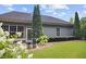 Spacious backyard featuring a well-kept lawn, mature trees, and a serene outdoor setting at 308 Shade Tree Cir, Woodstock, GA 30188