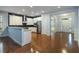 Modern kitchen featuring white cabinetry, stainless steel appliances, and granite countertops at 308 Shade Tree Cir, Woodstock, GA 30188