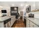 Modern kitchen with stainless steel appliances, granite countertops, and ample cabinet space at 7086 Gladstone Cir, Lithonia, GA 30038