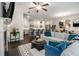Spacious living area that seamlessly connects the living room, dining area, and kitchen at 7086 Gladstone Cir, Lithonia, GA 30038