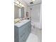 Updated bathroom with a stylish vanity, marble countertop, and a tiled shower-tub combo at 1150 Collier Nw Rd # B5, Atlanta, GA 30318