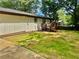 Backyard with a patio, a wooden deck and green space at 256 New Hope Rd, Lawrenceville, GA 30046
