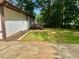 Backyard with patio, a wooden deck and green space at 256 New Hope Rd, Lawrenceville, GA 30046