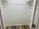 This is an empty walk-in closet with new floors at 256 New Hope Rd, Lawrenceville, GA 30046